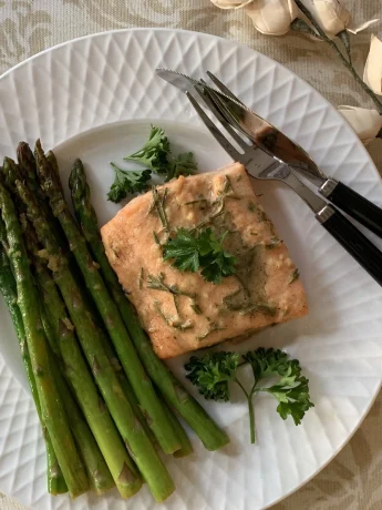 baked salmon with asparagus on table image