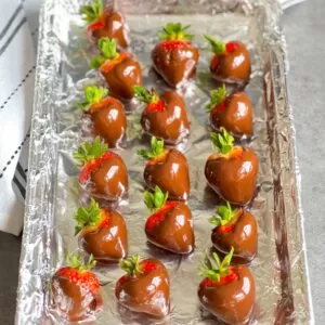 strawberry laid on foil lined plate